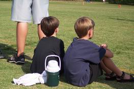 Watching their Daddy playing football
