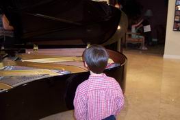 Patch checking out the grand pianos