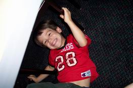 On the floor at Chuck E. Cheese's (ewwwwwwww)