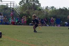 Alex running with the ball