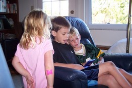 Danielle and Preston were watching Alex on the Game Boy