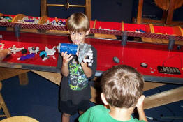 Showing off his robot