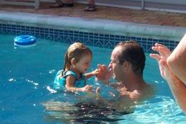 Mike and Julia - he's wrapped around her little finger!  ;-)