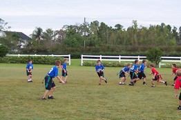 My little quarterback (holding the ball in the middle of the picture)