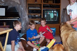 The birthday boy opening presents