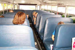 First time on a school bus!  (Parked in the parking lot)