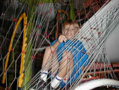 Alex in the play structure at the mall