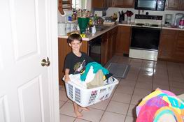 He's so strong!  He carried that basket all the way to the washer!