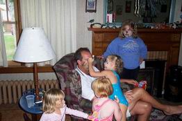 Ashley painting her Daddy