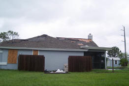 A roof torn off by the storms