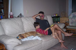 The camera flash lit up the room, but they were reading bedtime story by flashlight