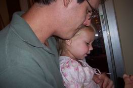 Danielle cuddling with Uncle Mark