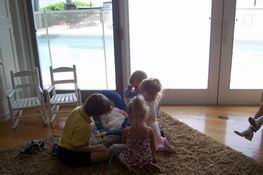 The little kids playing with Ryan