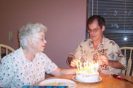 Mom and Mark lighting the inferno