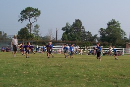Alex playing quarterback looking for a receiver
